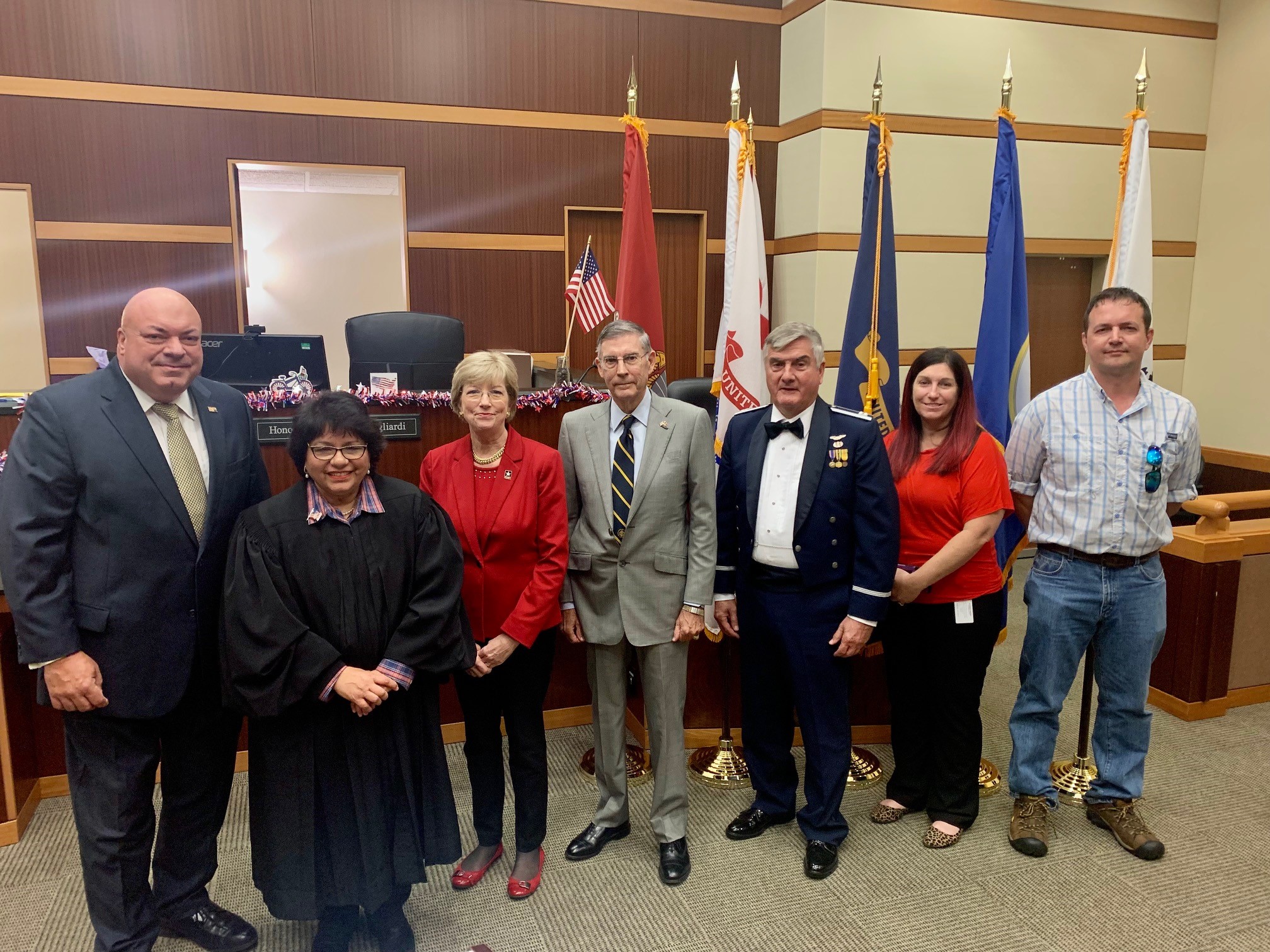 Guest speakers from left to right : Lee County Commissioner Cecil Pendergrass, Lee County Judge Josephine Gagliardi, Circuit Court Judge Margaret Steinbeck, US District Court Magistrate Judge Douglas N. Frazier, Attorney Michael Corso, Lee County Operations Division Manager Brooke Dean, and Isaac Peck, Specialist US Army National Guard